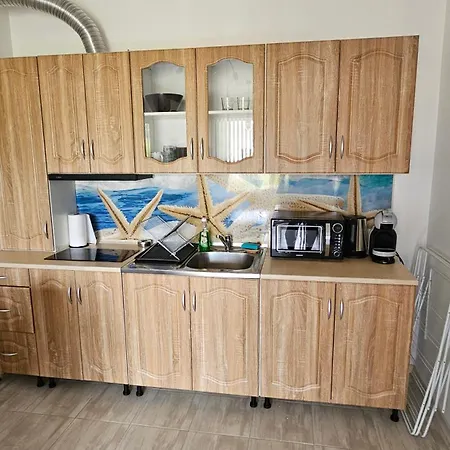 пясъчна лилия в Lily Beach Apartment *